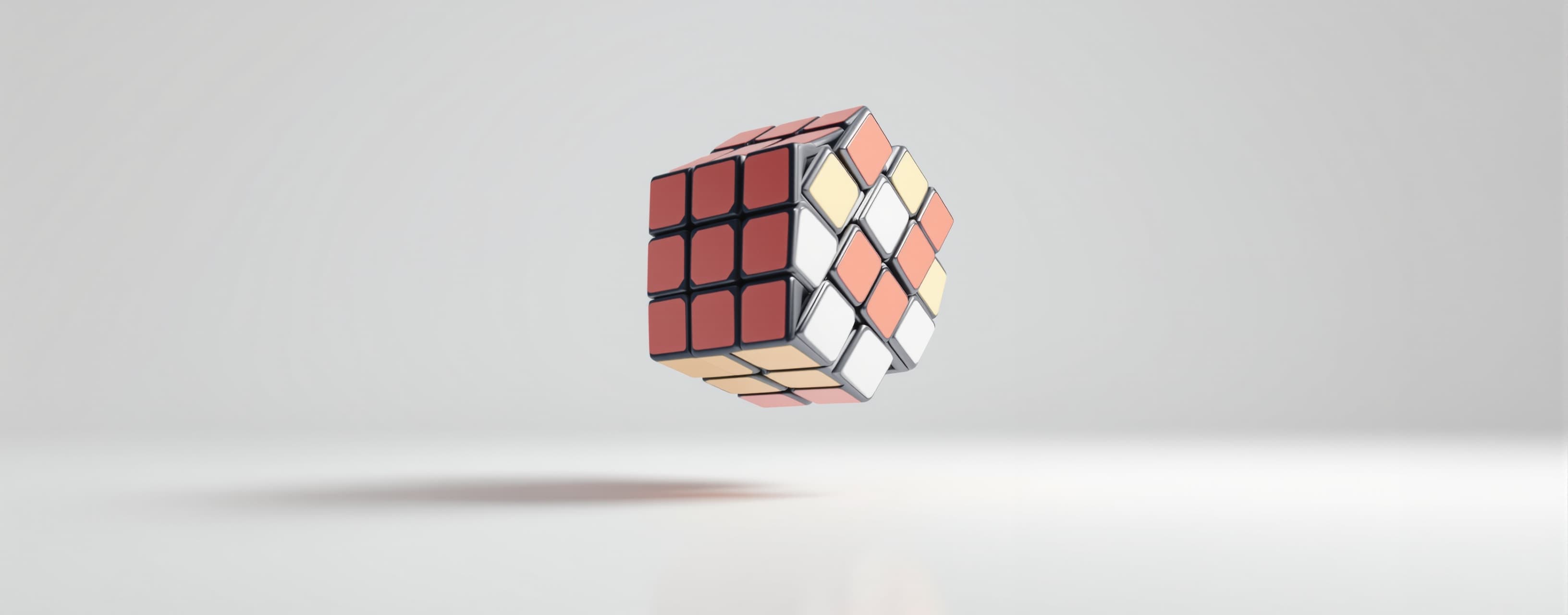 "A realistic 3x3 Rubik's Cube floating in mid-air over a cle...